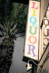 Obraz premium retro vintage liquor sign with palm tree