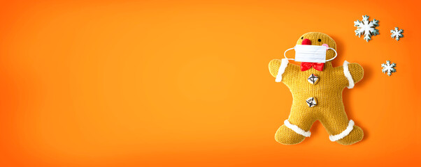 Gingerbread wearing a face mask - flat lay