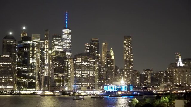 Pan Of Downtown Manhattan At Night With September 11th Memorial Lights