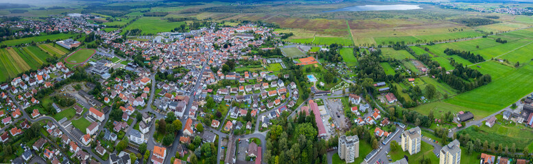 Fototapeta na wymiar Aerial view around the city Bad Buchau in Germany on a cloudy day in summer