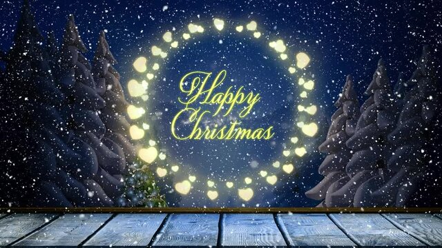 Animation of happy christmas text with fairy lights and snow falling over winter landscape