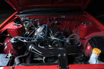 Fototapeta premium red old racing car under the hood old engine