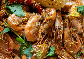 oysters in cream sauce.decorated with black caviar and greens