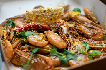 oysters in cream sauce.decorated with black caviar and greens