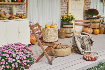 Autumn harvest terrace background. Halloween. Country. Pumpkins and flowers. Vacation home. Thanksgiving Day
