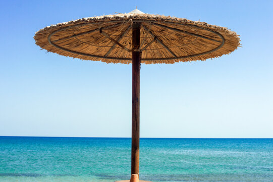 Sun umbrella at the beach. Zephyros beach. Greece