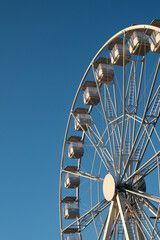 Ferris wheel entertainment. Blue sky