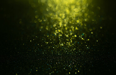 Abstract green glitter lights on de-focused background.