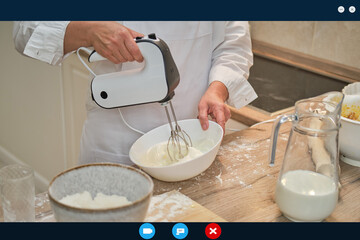 Online video call, cooking recipes in an internet blog. Online conference of chefs and training of bloggers in home kitchen.