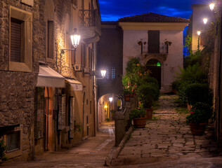 Republic San Marino. Old street at sunset.
