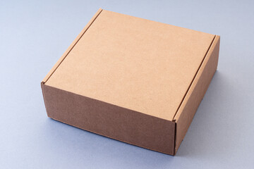 Cardboard box for gift, parcels. Blue background