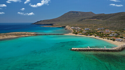 Aerial drone photo of main port of Kythera island and turquoise exotic beach of Diakofti, Ionian, Greece