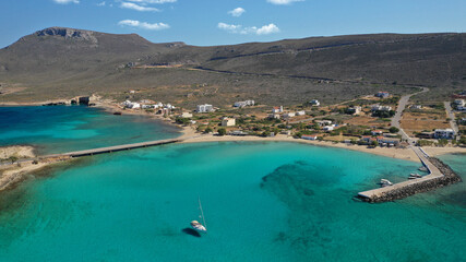 Aerial drone photo of main port of Kythera island and turquoise exotic beach of Diakofti, Ionian, Greece