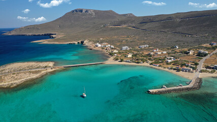 Aerial drone photo of main port of Kythera island and turquoise exotic beach of Diakofti, Ionian,...
