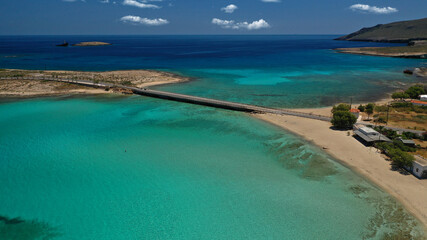 Aerial drone photo of main port of Kythera island and turquoise exotic beach of Diakofti, Ionian, Greece