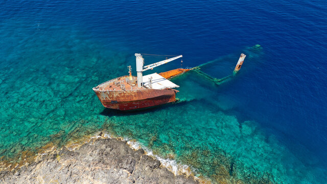 Aerial drone photo of famous shipwreck of "Nordland" half sunk ship in islet of Prasonisi near Diakofti main port of Kithira island, Ionian, Greece