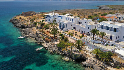 Aerial drone photo of iconic seaside traditional village and castle of Avlemonas, Kythira island,...