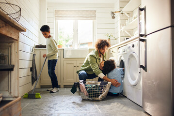 Two boys helping father with household chores - obrazy, fototapety, plakaty