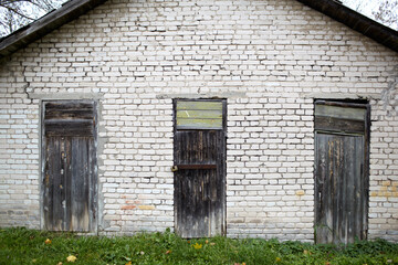 Fototapeta na wymiar Three doors in the old garage.