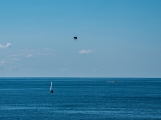 Kite surfing on the sea at sunny day
