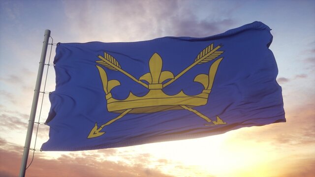 Suffolk flag, England, waving in the wind, sky and sun background. 3d rendering