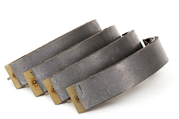 Set of asbestos brake pads, replacement spare parts of the car brake system, isolated on white...