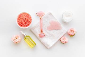 Facial spa skin care cosmetics products with stone massage roller and gua sha