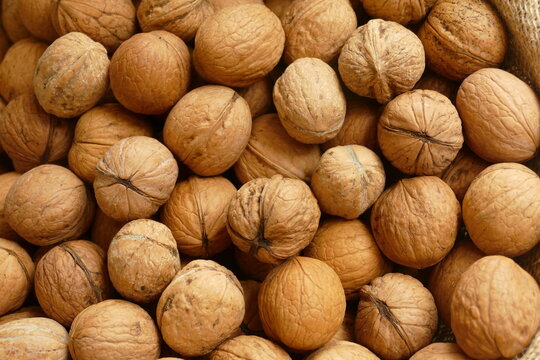 Organic Walnuts, close up. Natural background.