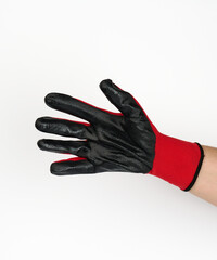 hand in a textile work glove in a gesture of holding something on a white background