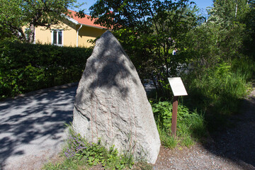 Ancient rune stone at Sigtuna in a sunny day, Sweden.