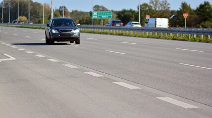 View on a concrete highway. Modern highway safety markings on concrete.