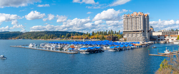 Panoramic view from Tubbs Hill park of the resort, marina and boardwalk alongside the city beach and park at autumn in Coeur d'Alene, Idaho, USA.