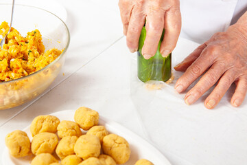 Preparation of the traditional patties from the region of Cauca in Colombia, called empanadas de pipián