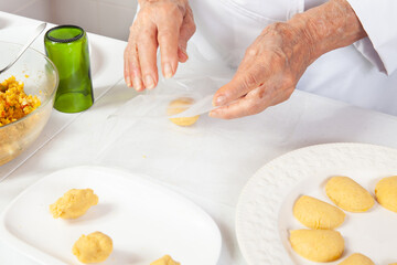 Preparation of the traditional patties from the region of Cauca in Colombia, called empanadas de pipián