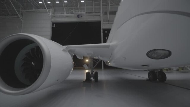 the new plane takes off from the hangar