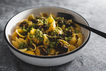 vegan homemde rustic pesto and aubergine shell pasta, healthy plant-based food