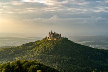 Castle Hohenzollern in the golden light of a sunset - obrazy, fototapety, plakaty