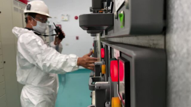 Electrical engineer to racking out power switch module in substation for separate electrical energy