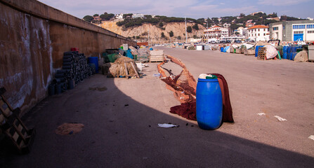 fishing nets on the ground in fishing port to fix and retrieve