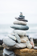 Balanced stack of stones on beach
