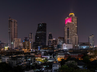 Fototapeta premium Bangkok, thailand - Feb 07, 2020 : Skyscrapers in the business district in Bangkok In the night. Bangkok night view give the city a modern style. Selective focus.