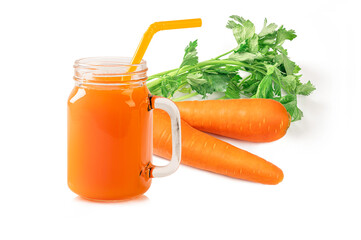 Carrot juice in glass jar  and carrots on white background