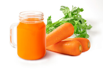 Carrot juice in glass jar and carrots isolated on white background.