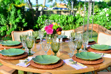 table setting in the garden, ornamental flowers