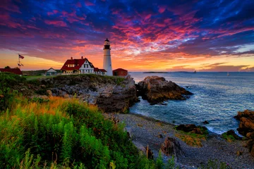 Zelfklevend Fotobehang lighthouse at sunset © William Higgins