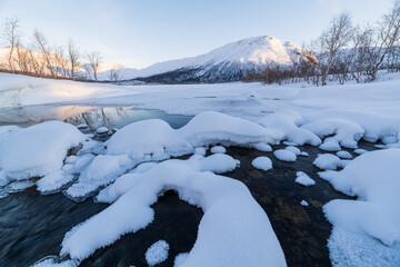 Natural scenery in winter, cold winter in Europe, snow-covered forest. Finland, a popular tourist...