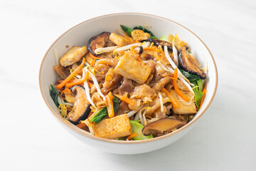 stir-fried noodles with tofu and vegetables