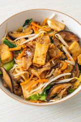 stir-fried noodles with tofu and vegetables