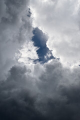 Cumulonimbus cloud formations on tropical sky , Nimbus moving , Abstract background from natural phenomenon and gray clouds hunk , Thailand