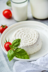fresh ricotta with basil leaf and tomato